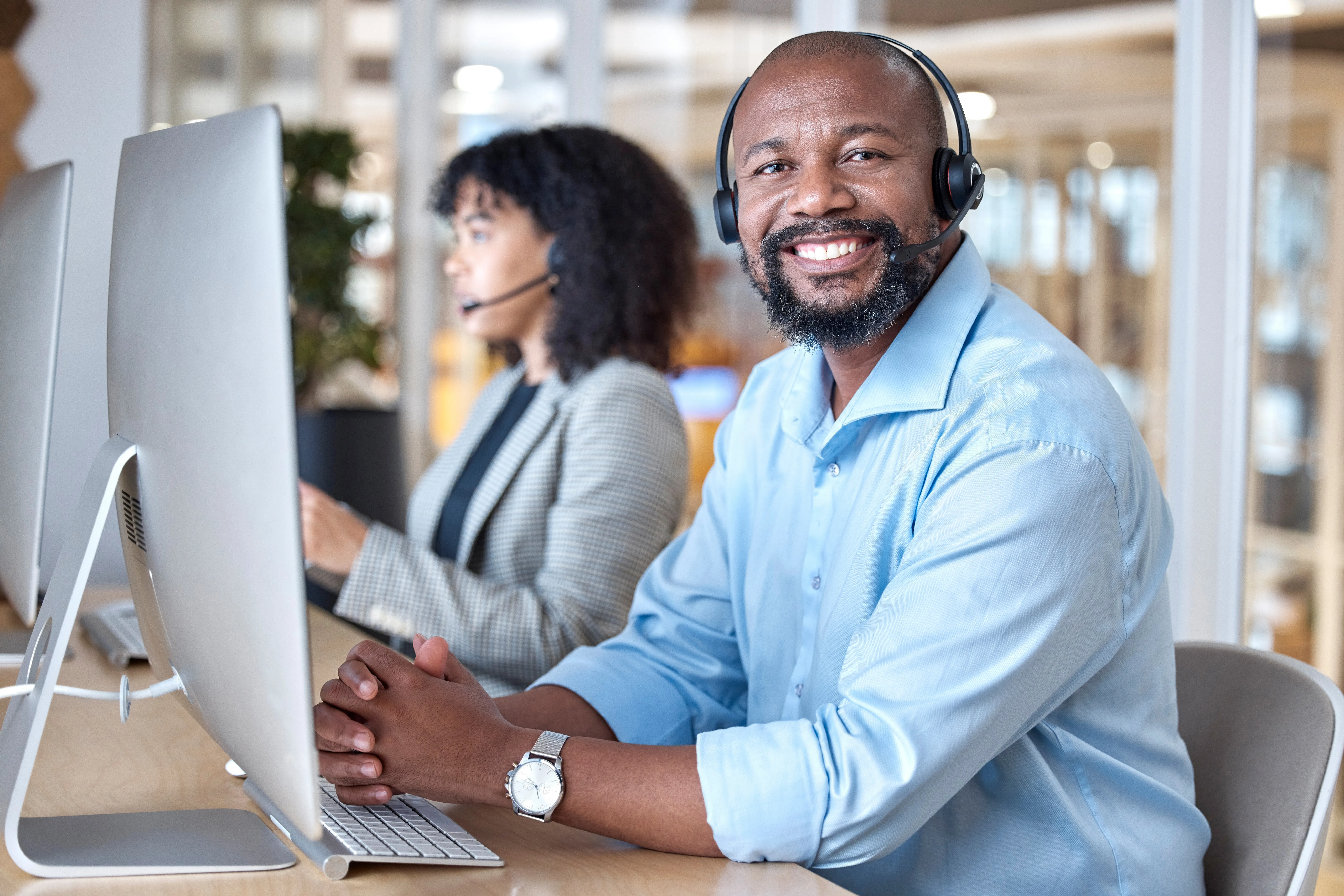 call center portrait of black man smiling